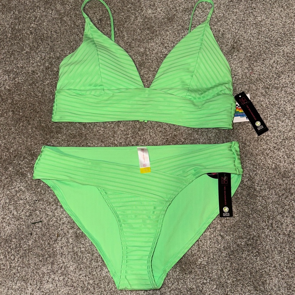 2 piece women’s bathing suit in lime green.